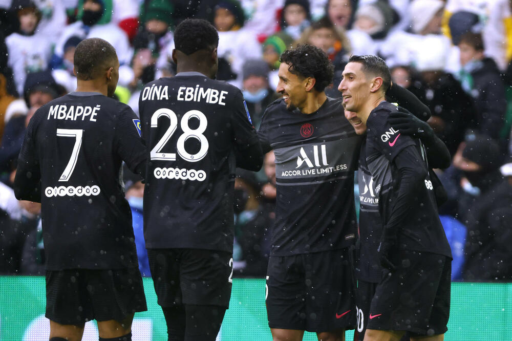 Markinjoš i Di Marija u zagrljaju sa Mesijem, Foto: Reuters