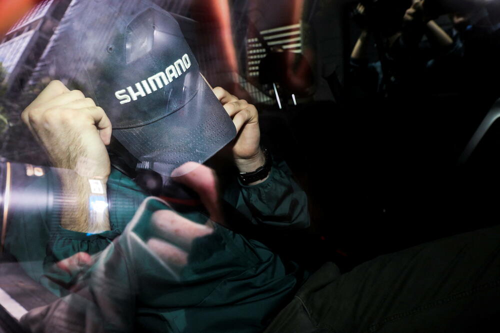 Đoković na putu ka pritvoru, Foto: Reuters