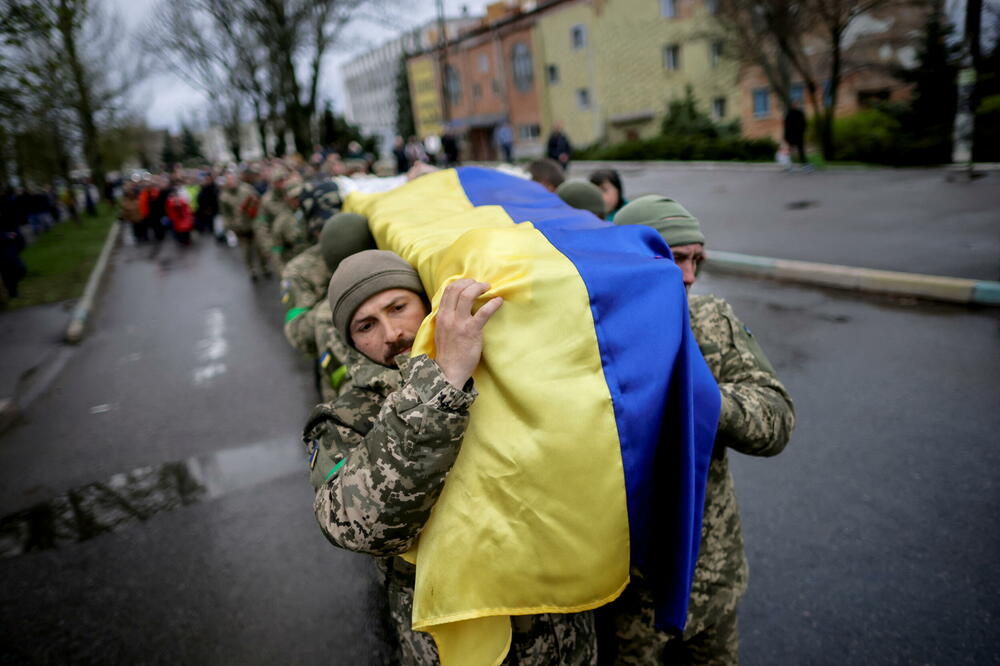 Sa sahrane ukrajinskog oficira koji je ubijen u Zaporoškoj oblasti, Foto: UESLEI MARCELINO