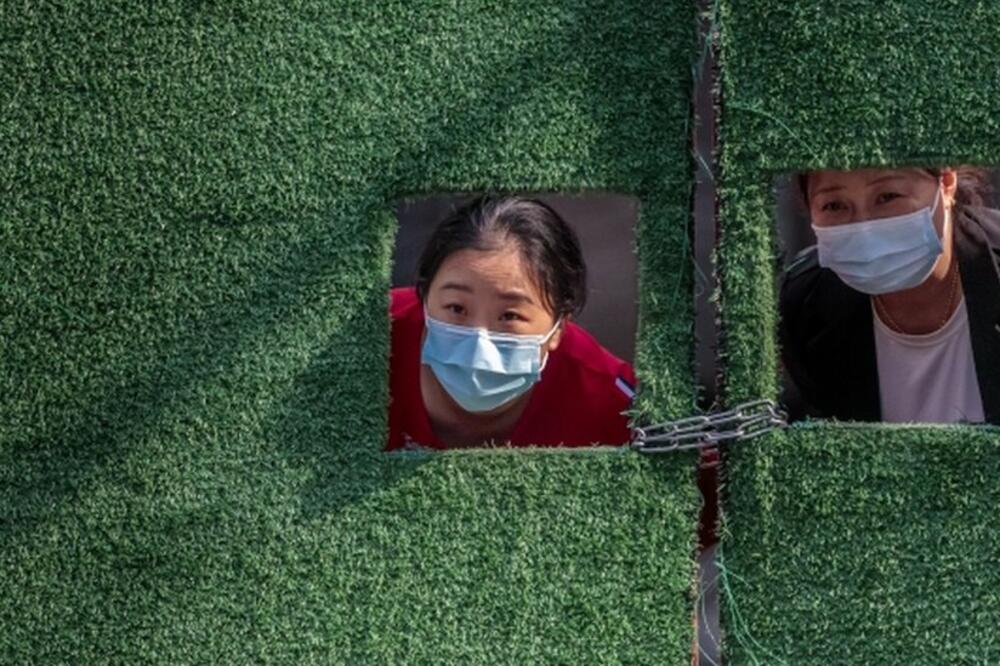 Cilj od „nijednog pozitivnog slučaja" van oblasti kontrolisanog karantina je blizu - nakon što su stanovnici Šangaja bili osuđeni ne neizlazak iz kuća, Foto: EPA