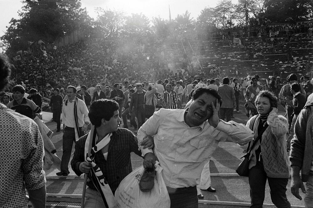 Navijači italijanskog Juventusa beže sa tribina stadiona Hejsel, Foto: DOMINIQUE FAGET/AFP via Getty Images