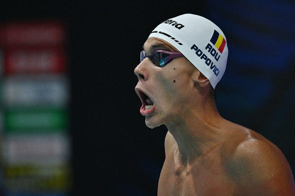 Rumunski junor David Popović zlatni i na 100 metara slobodno, Foto: REUTERS