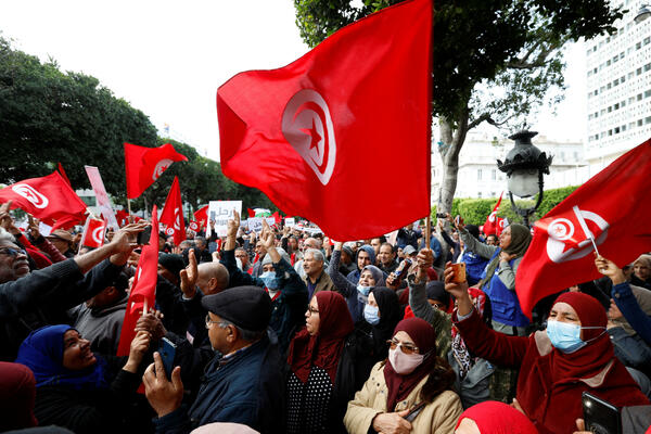 A court in Tunisia sentenced four people to death for the murder of a politician...