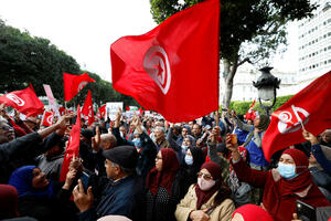 A court in Tunisia sentenced four people to death for the murder of a politician...