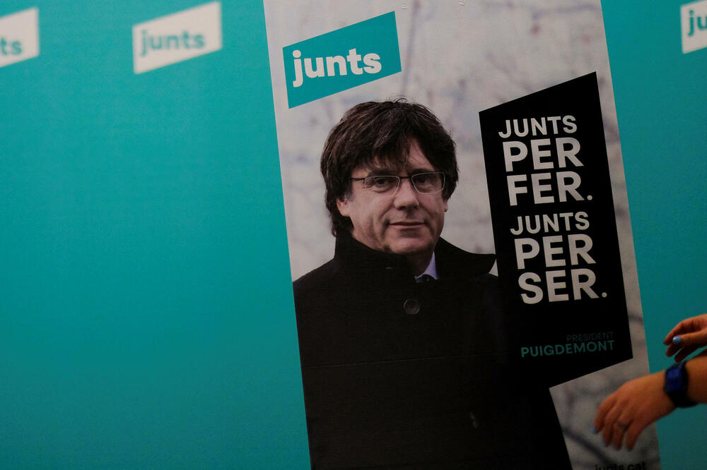 Poster sa likom Pudždemona u sjedištu partije u Barseloni, Foto: REUTERS