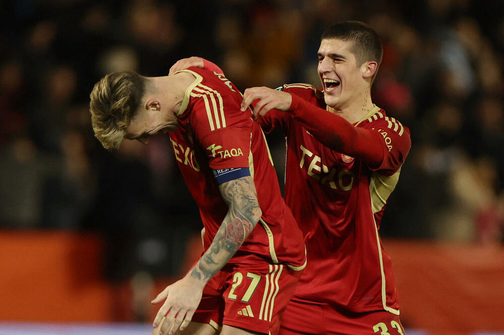 Rubežić slavi pobjedu sa kapitenom Aberdina, Foto: REUTERS