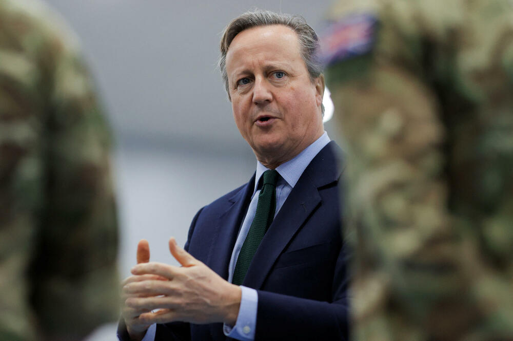 Cameron last week with British troops in Kosovo, Photo: Reuters