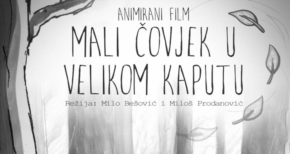 Mali čovjek u velikom kaputu