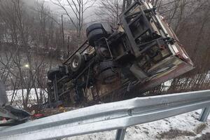 The truck left the road and overturned, no one was injured