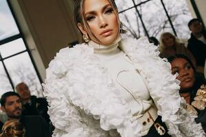 Jennifer Lopez in a coat made of 7000 real rose petals