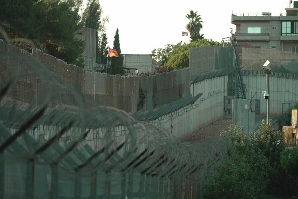 A barbed wire fence and cameras stretch along the border around the Israeli town of Metula, Photo: BBC