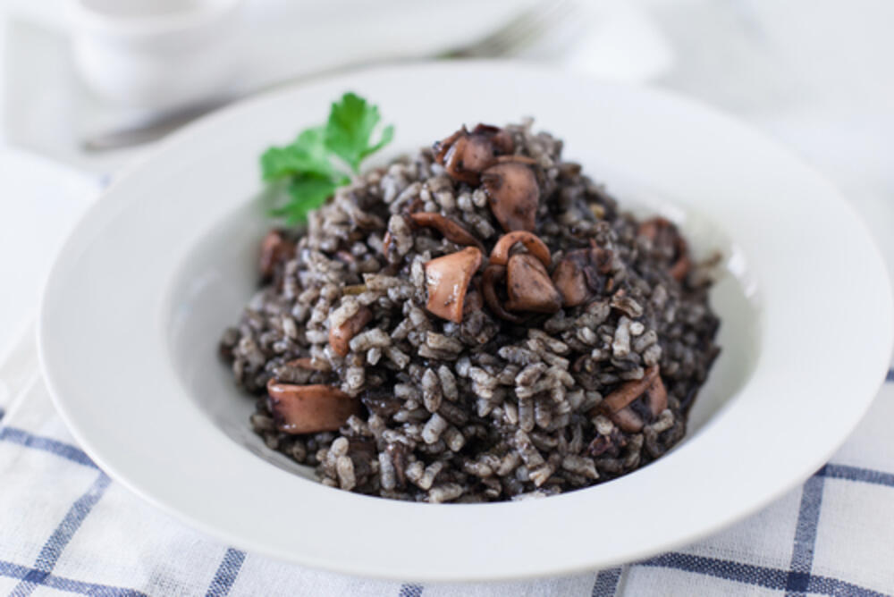 Black risotto is specialty on the coast