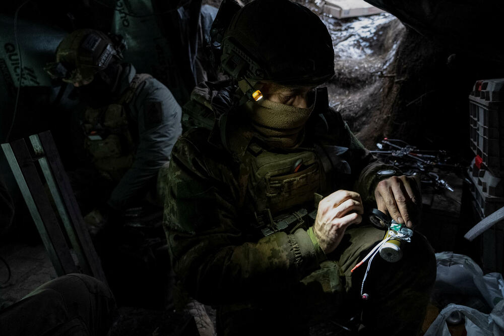 A Ukrainian soldier of the 47th Brigade prepares a first-person grenade (FPV) at his position, Photo: REUTERS