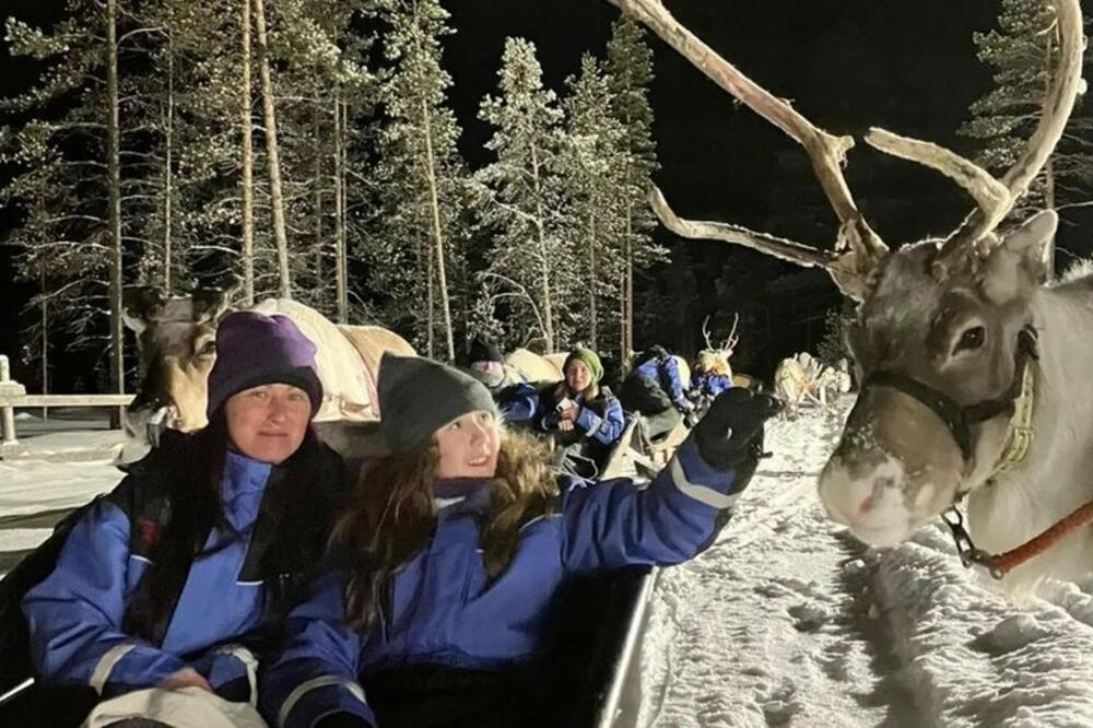 The little girl enjoyed reindeer sledding with her mother, Photo: Supplied
