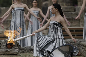 The Olympic flame lit in ancient Olympia