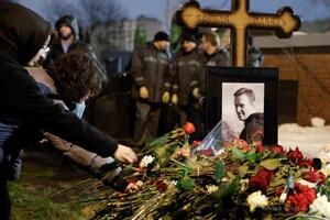 "Repentance" for praying at Navalny's grave