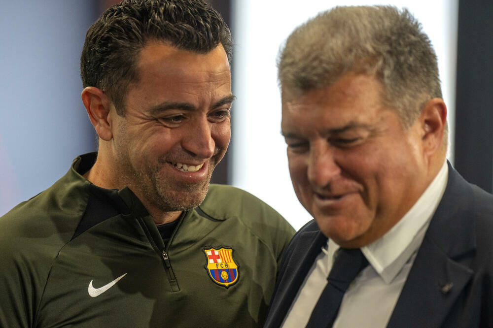 Xavi and Barca president Joan Laporta, Photo: Beta/AP