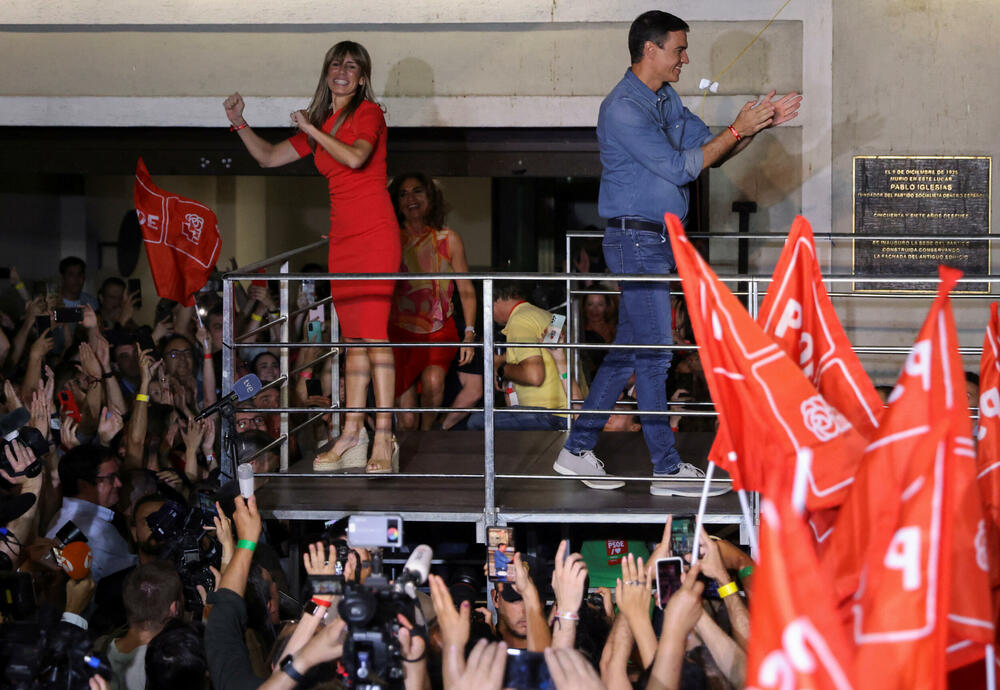 Sanchez with his wife during the July elections