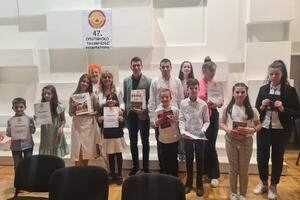 Vasilisa, Milica and Dušan, winners of the municipal competition...
