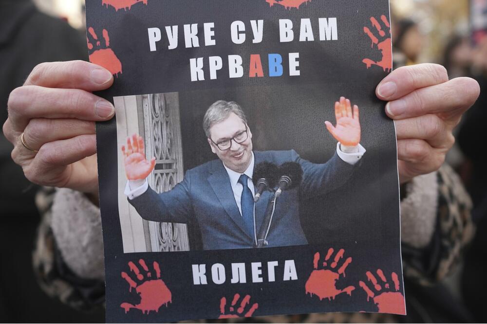 Poster sa protesta u Beogradu, Foto: BETA/AP