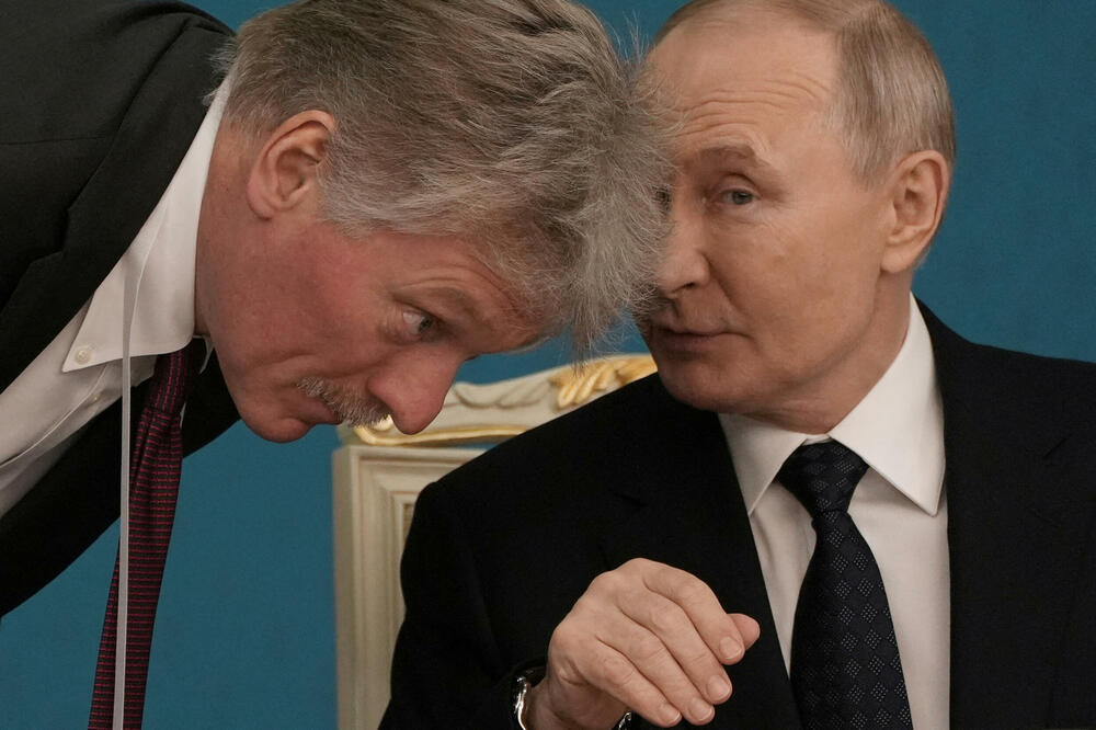 Dmitrij Peskov i Vladimir Putin, Foto: Reuters