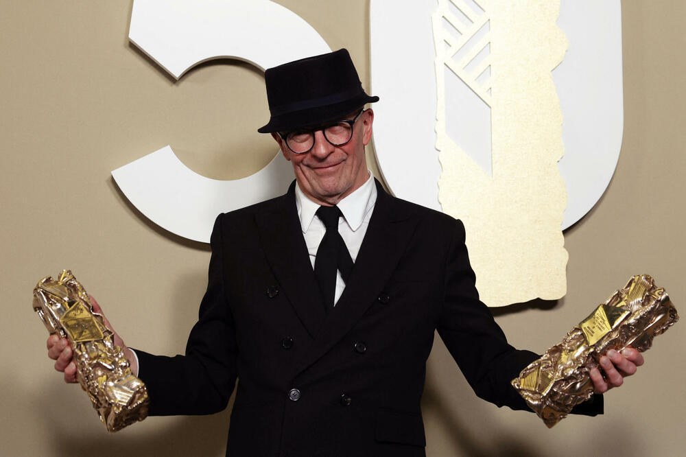 Žak Odijar sa nagradama ba 50. dodjeli nagrada Cezar u Parizu, Foto: Reuters