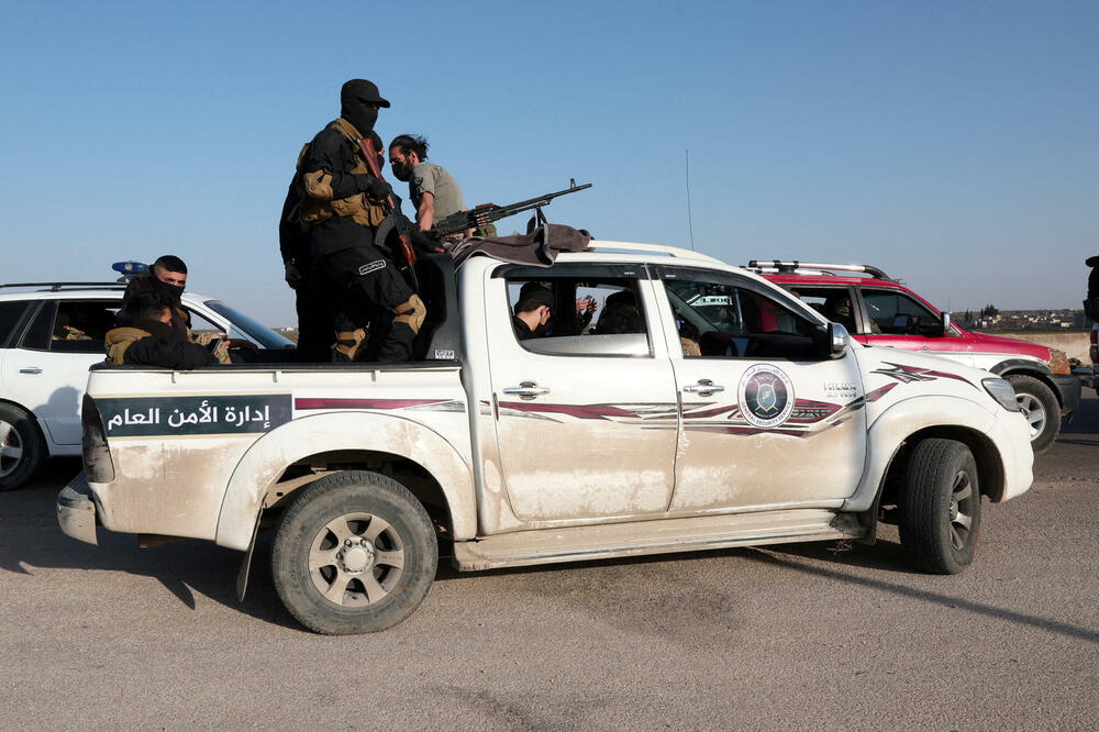 Pripadnici sirijske vojske putuju vojnim vozilom ka Latakiji., Foto: REUTERS