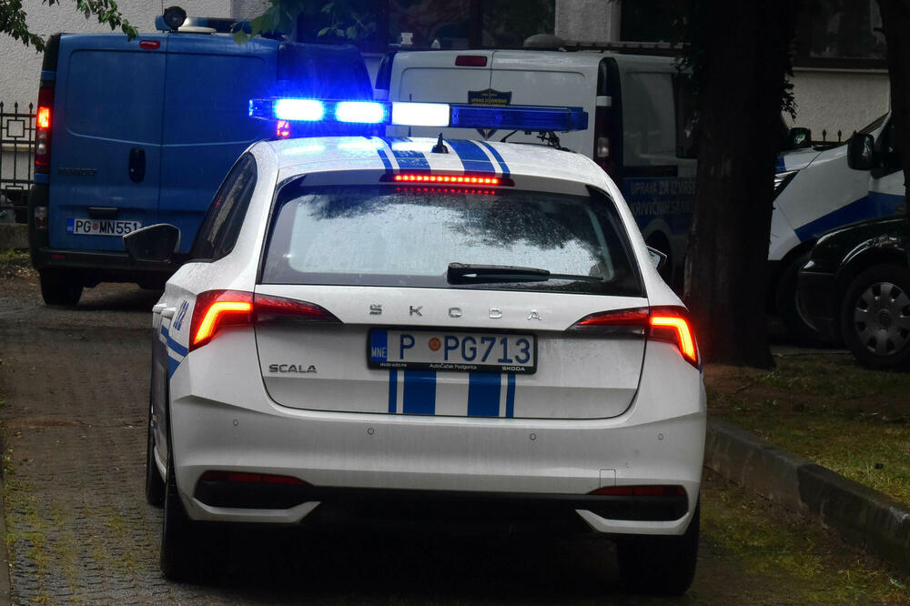 Policijski auto u dvorištu zgrade Višeg suda u Podgorici (ilustracija), Foto: BORIS PEJOVIC