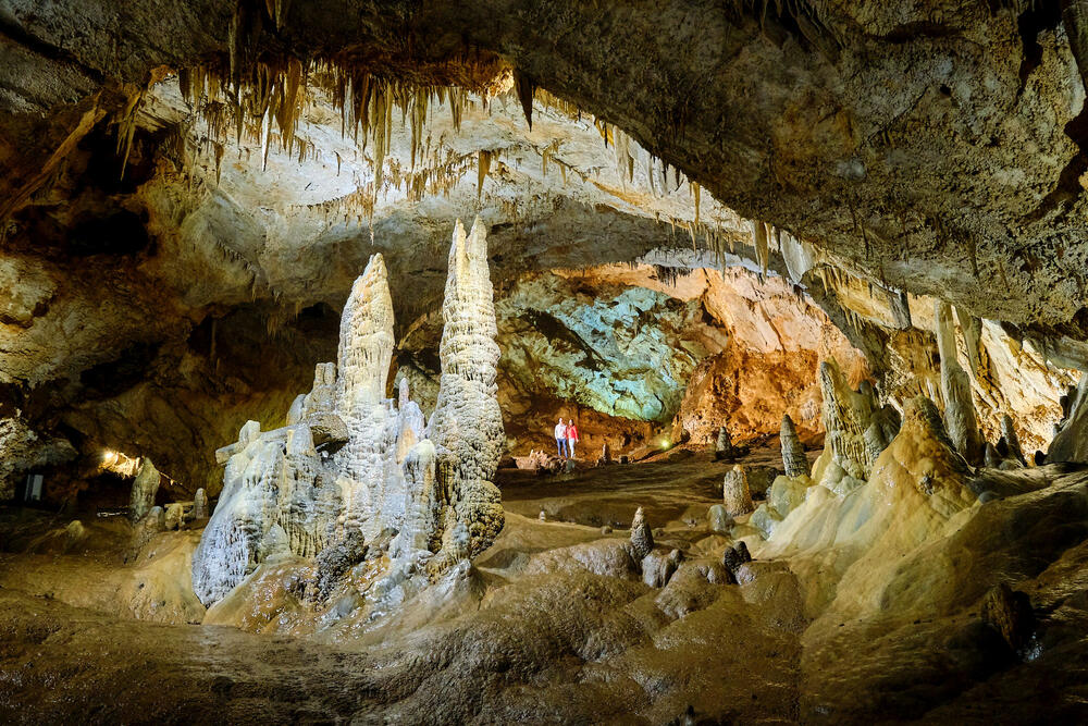 <p>This tour begins with a scenic train ride through a vibrant landscape after which a guide takes visitors on a journey of exploration along designated path. In the duration of 60 minutes, you’ll be immersed into the mystical world of underground galleries shaped over the course of thousands of years, where the magnificent natural abundance is revealed in its full splendor</p>