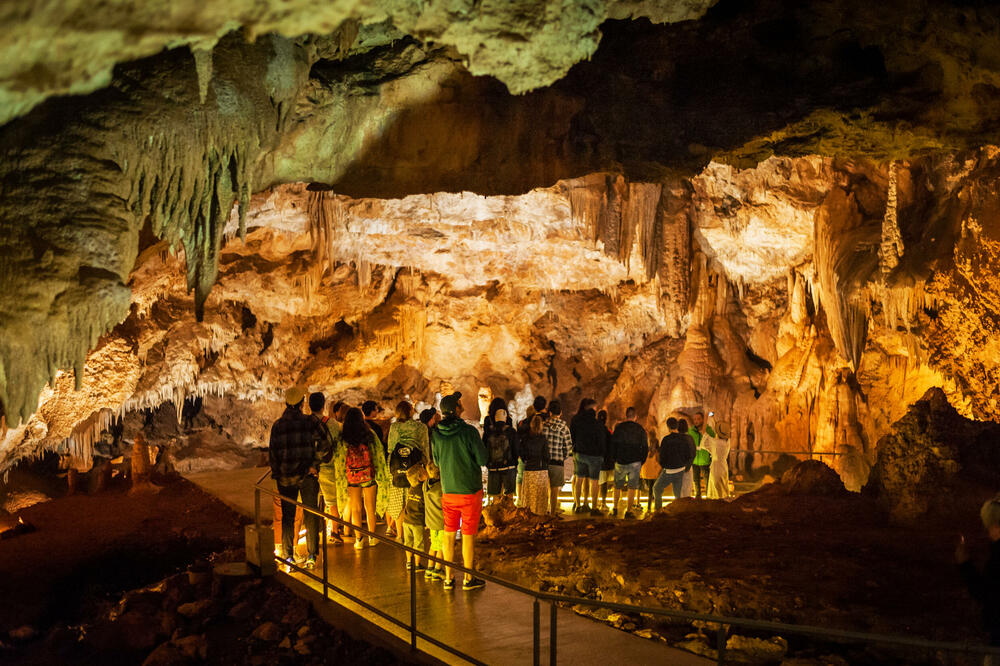 <p>This tour begins with a scenic train ride through a vibrant landscape after which a guide takes visitors on a journey of exploration along designated path. In the duration of 60 minutes, you’ll be immersed into the mystical world of underground galleries shaped over the course of thousands of years, where the magnificent natural abundance is revealed in its full splendor</p>