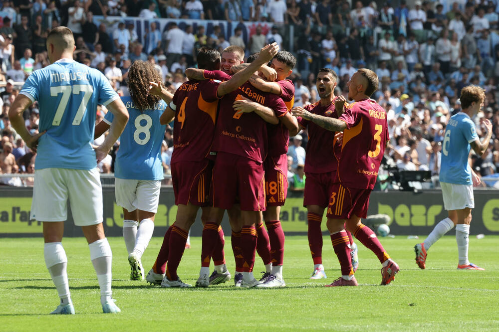 Igrači Rome slave Pelegrinija, Foto: REUTERS