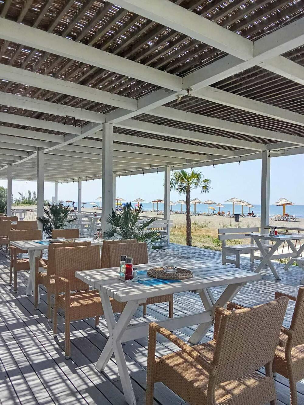 Restaurant and beach in the background