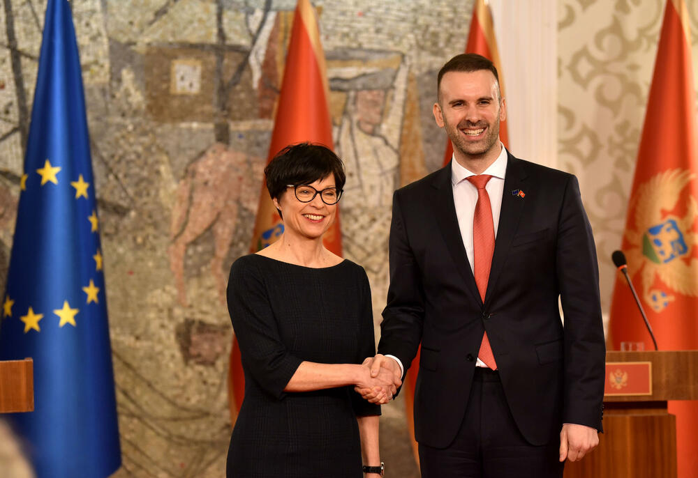 Marta Kos, Milojko Spajić