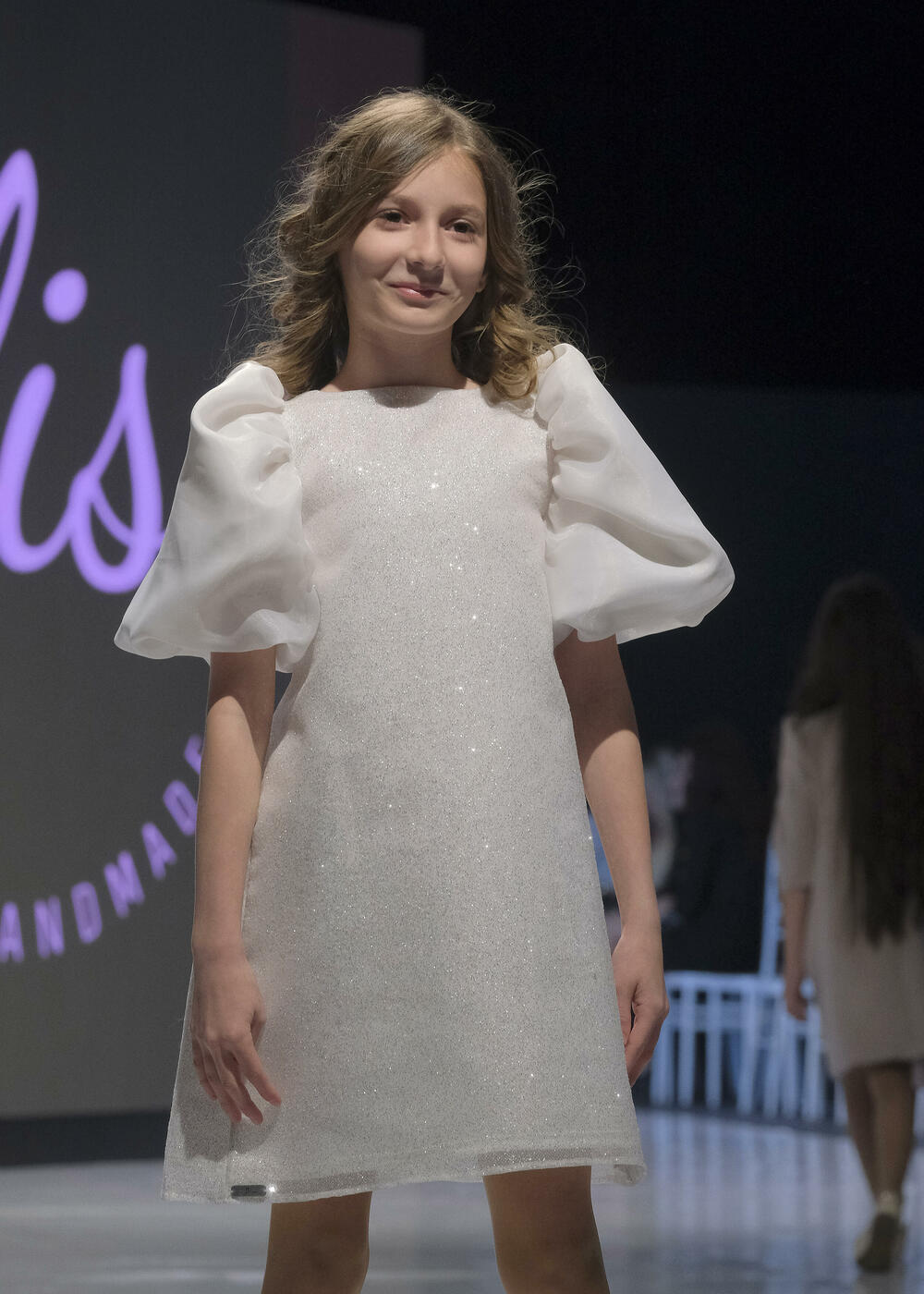 <p>Publici su predstavljene kolekcije ukrajinske dizajnerke Vitaline Smitko - Vitalina for Kids, kao i modeli srpske dizajnerke Vedrane Milanović - Atelje Luccino</p>