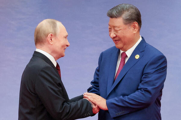 Putin arrives in Beijing for summit with Xi Jinping
