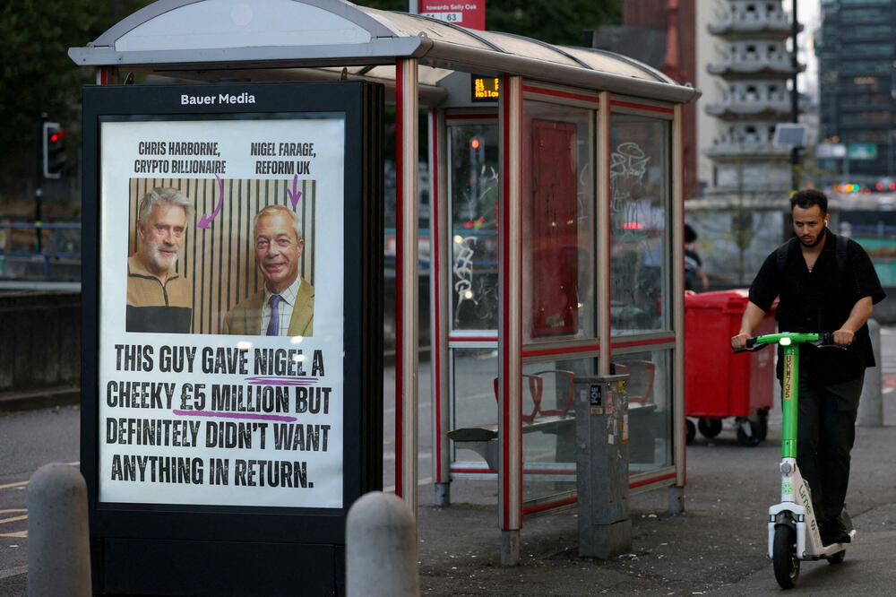 Plakat kampanje protiv Najdžela Faraža i stranke Reform UK u Birmingemu, Foto: Rojters